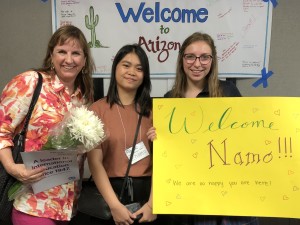 Namo, center, is welcomed by her host Mom, Mrs. Moffitt, and Clara Moffitt.