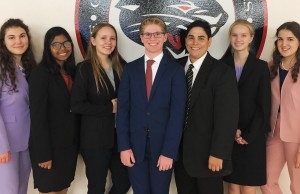 High school Speech and Debate Team members, from left: Stella Lovelady, Nishat Ahmed, Sydney Wickelgren, Connor Clark, Natsuki Saballos, Elizabeth Hollmann, Violeta Panayotova.