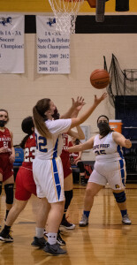 Natalie Whitmer snags the rebound.